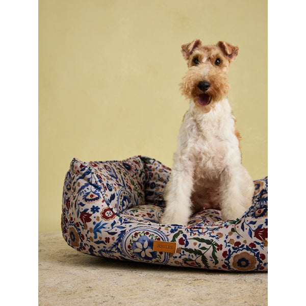 Fox Terrier sat on Joules Festival Floral Box Bed