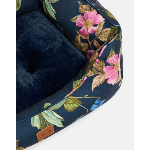 Close up of Joules Botanical Floral Box Bed with plush cushion