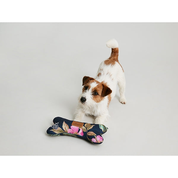 Dog playing with Joules Botanical Floral Comfort Bone