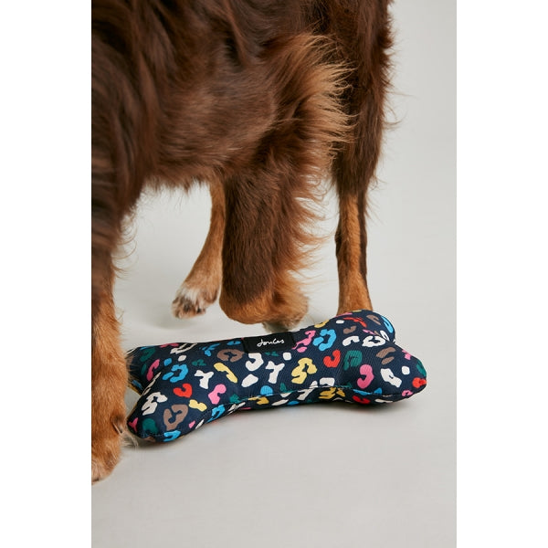 Dog stepping over Joules Multi-Bee Print Comfort Bone