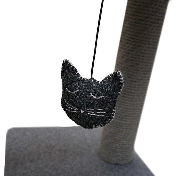 Close up of catnip toy on Charcoal Felt Cat Triple Tower