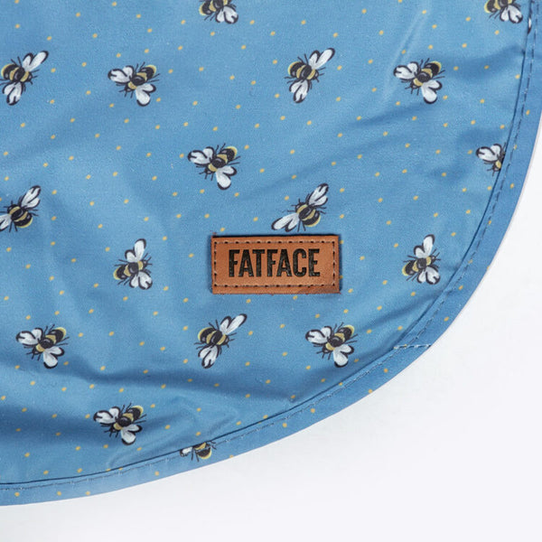 Close up of logo and print on Danish Design FatFace Spotty Bees Raincoat