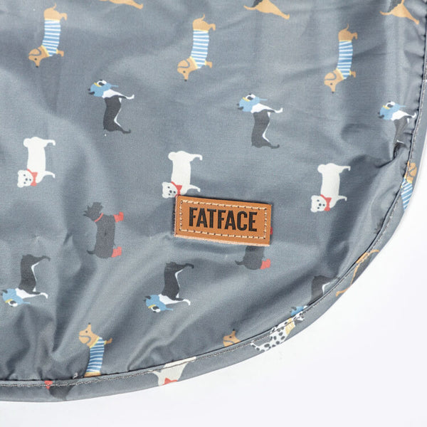 Close up of logo and print on Danish Design FatFace Marching Dogs Raincoat