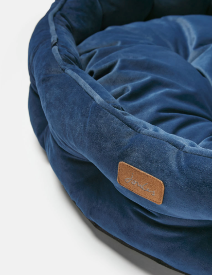 Close up of front detailing of Joules Chesterfield Pet Bed in Navy