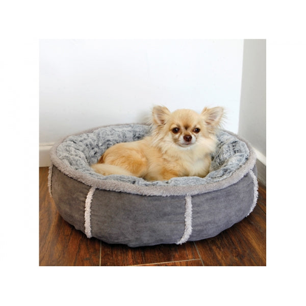 Dog laying in Deep Plush Grey Donut Bed